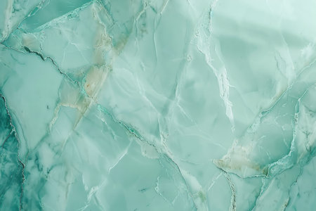 A close-up of a green marble texture with intricate veins and a smooth polished surface.の素材