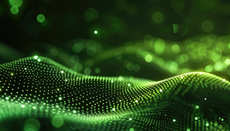 An abstract background with a green wavy surface composed of glittering dots, blurred green bokeh lights, and a dark background.の素材