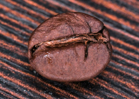Coffee bean on a wooden tableの写真素材