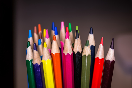 Colorful pencils on black backgroundの写真素材