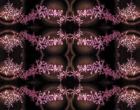A frozen kaleidoscopic pattern from real snow flakes on the surface of light emitting diode lamp