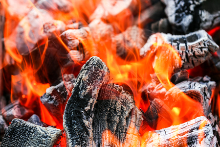 Burning charcoal with hot flameの写真素材