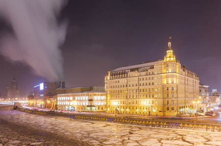 Frozen Moscow river near five star hotel tonight in Christmasのeditorial素材