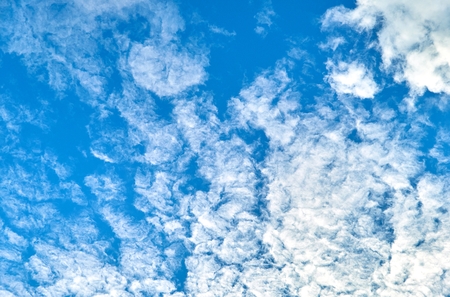 Blue cloudy sky background in summerの写真素材