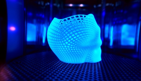 Ultraviolet polymerization of 3D printed glowing skull in mirror sealed chamber