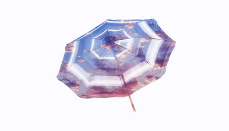 Silhouette of rain umbrella filled with dramatic sunset clouds and isolated on white backgroundの写真素材