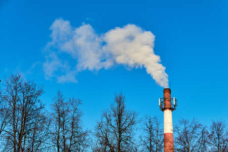 Red tube on background of blue cloudy sky in Moscowの写真素材