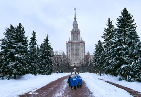 Moscow, Russia - January 12 2020: Vibrant view of white winter campus of famous Russian university with snowed trees in Moscowのeditorial素材