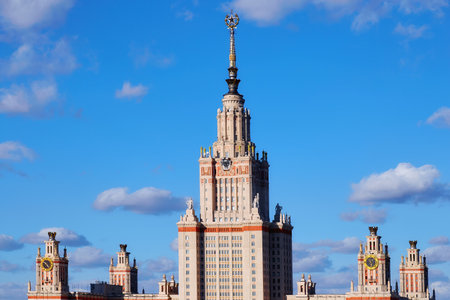 Moscow, Russia - April 7 2021: Fragments of building and towers in campus of famous university in Moscow under blue sunset skyのeditorial素材