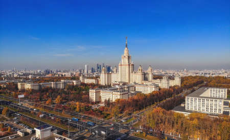 Moscow, Russia - October 10 2021: Aerial dron panoramic view of campus buildings of famous Moscow university under blue sky in autumnのeditorial素材