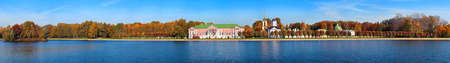Moscow, Russia - October 5 2021: Panoramic wide angle view of pond reflections of historic Kuskovo buildings and sunny autumn parkのeditorial素材