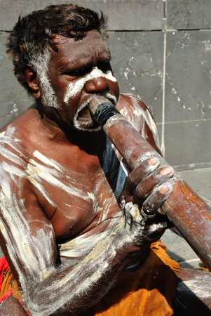 Aboriginal man performing for passing tourists, Australia, Melbourneのeditorial素材