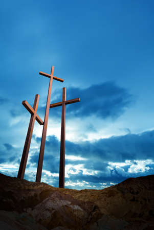 Three crosses on the mountain Golgotha representing the day of Christâs crucifixionの写真素材