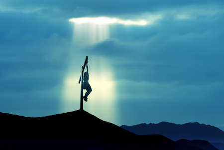 Jesus Christ Son of God over blue sky backgroundの写真素材