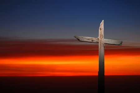 Christian cross at sunrise or sunset concept of religionの写真素材