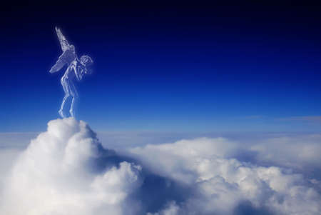 Beautiful angel looks down from heaven with copy space