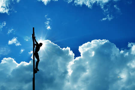 Jesus Christ statue against blue sky background panoramic viewの写真素材