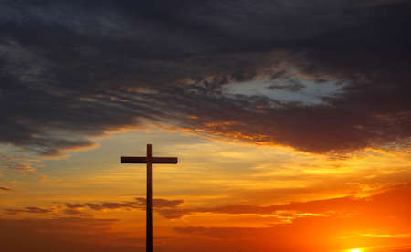 Christian cross over beautiful sunny sky panoramic viewの写真素材