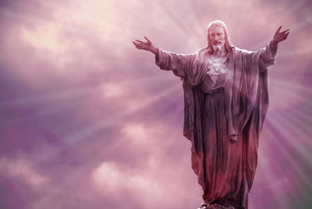 Jesus Christ in Heaven with rays of light religion conceptの写真素材