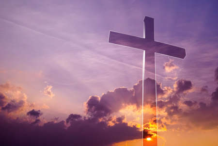 Transparent cross symbol of religion over dramatic skyの写真素材