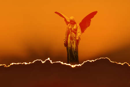Beautiful angel in heaven with divine rays of sun lightの写真素材