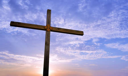 Wooden cross at sunrise or sunset concept of religionの写真素材