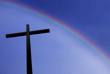 Christian Cross over blue sky concept of religionの写真素材