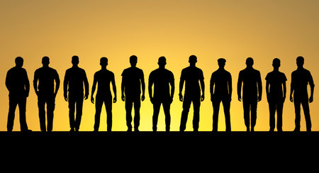 Group of men standing in a row on sunset backgroundの写真素材