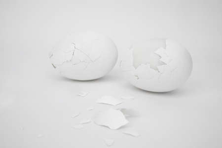 eggs and eggshell on a white backgroundの写真素材