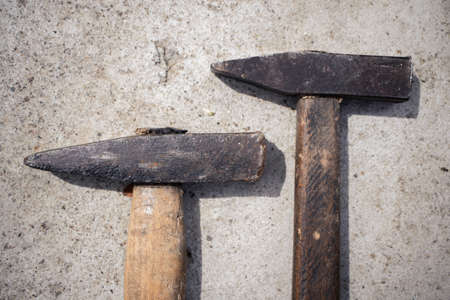 Hammer and nails on cement, textureの写真素材