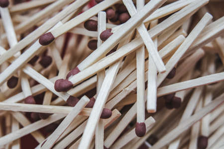 Scattered on a pile of wooden sticks matchesの写真素材