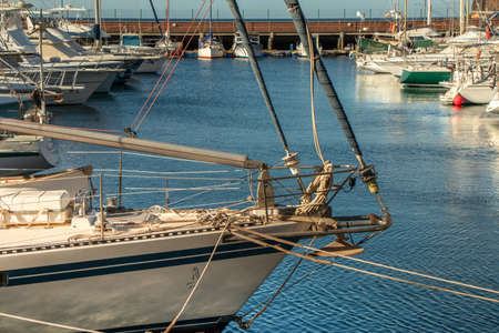 Port of boats and yachts with reflection in the water, San Sebastian, La Gomera, Spain