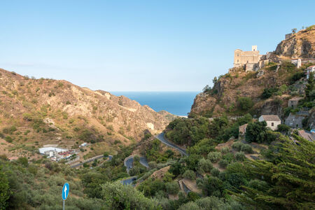 Landscape mountain street and church with sea の写真素材