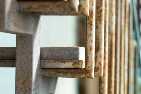Metal staircase with stone steps and rustの写真素材