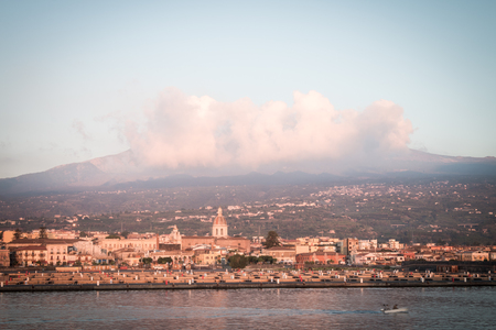 Volcano Etna photographed from Riposto before dawnの写真素材