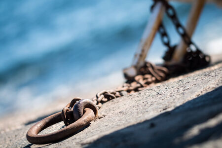 Rusty chains for small fishing boats in Ripostoの写真素材