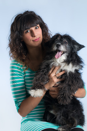 woman posing with her dogの写真素材
