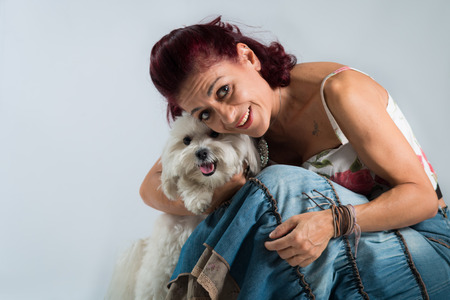 woman posing with her dogの写真素材