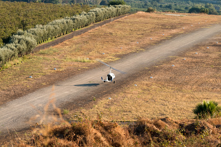 Gyrocopter single pilot prepares to land on the small trackの写真素材