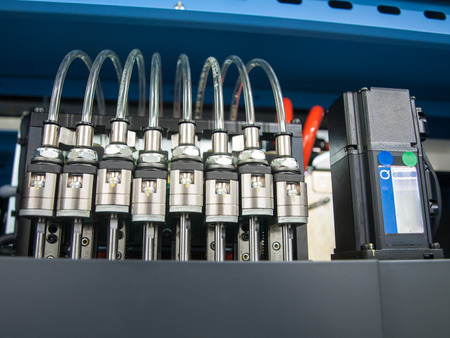 solenoid valves with transparent plastic pipes and motorの写真素材