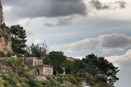 Isola Bella Taormina in a cloudy dayの写真素材