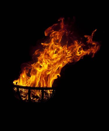 Fire bowl burning in the night.の写真素材