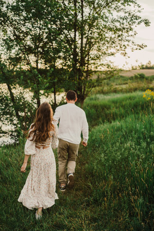 A couple in love on a walk, happiness and joy. Manifestation of feelings.の写真素材