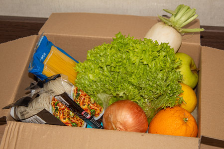 Open delivery box for donations, aid, side viewの写真素材