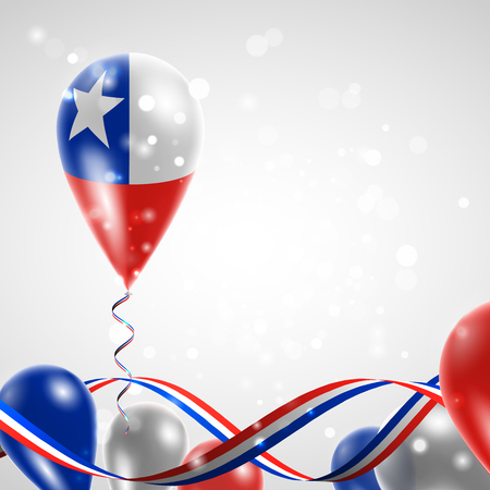 Flag of Chile on balloon. Celebration and gifts. Ribbon in the colors of the flag are twisted under the balloon. Independence Day. Balloons on the feast of the national day. Flag of Chile on balloon. Celebration and gifts. Ribbon in the colors of the flag are twisted under the balloon. Independence Day. Balloons on the feast of the national day.