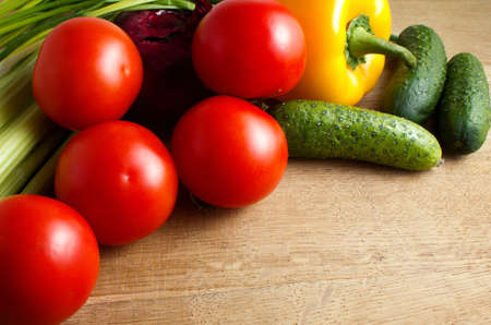 abstract design background vegetables on a wooden backgroundの写真素材