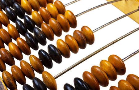 Fragment of old abacus on white background