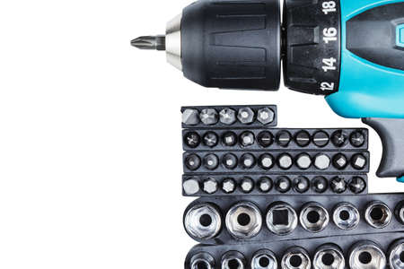 Screwdriver with set of bits isolated on whiteの写真素材