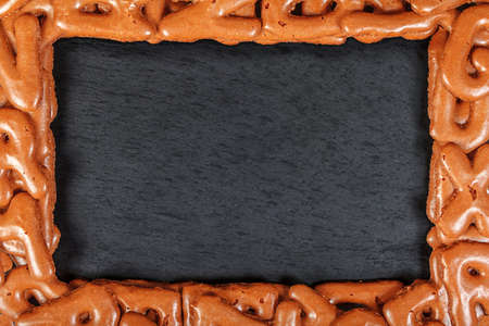 Slate plate framed with alphabet cookiesの写真素材
