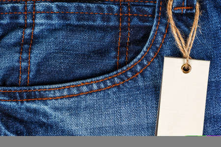 Close-up of jeans pants with paper tagの写真素材
